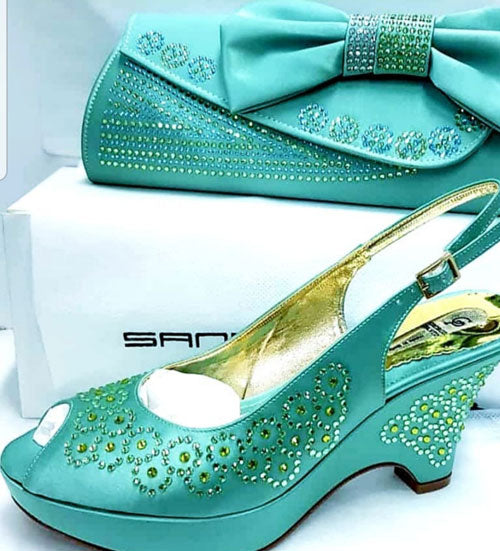 High end Teal satin shoes and bag with leather sole